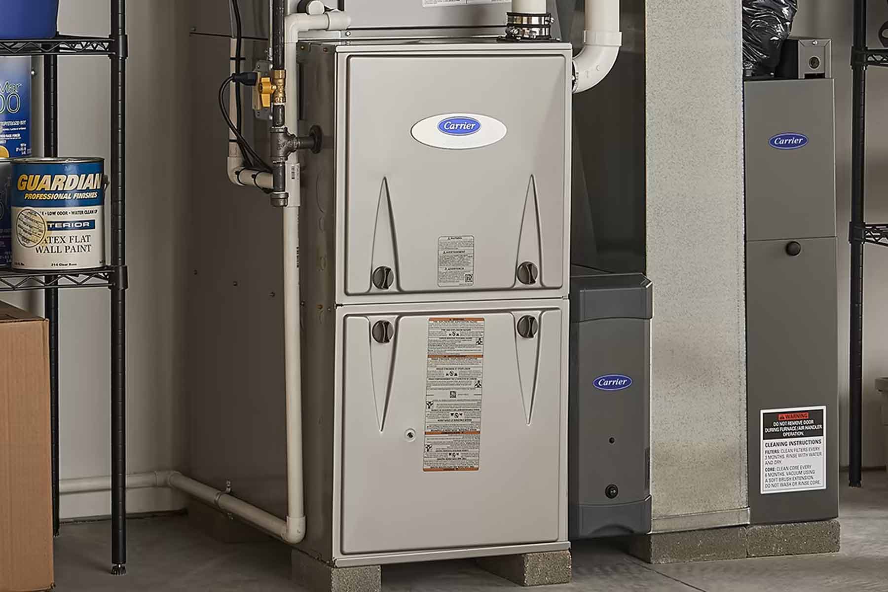 Close up of an HVAC technician repairing a gas furnace